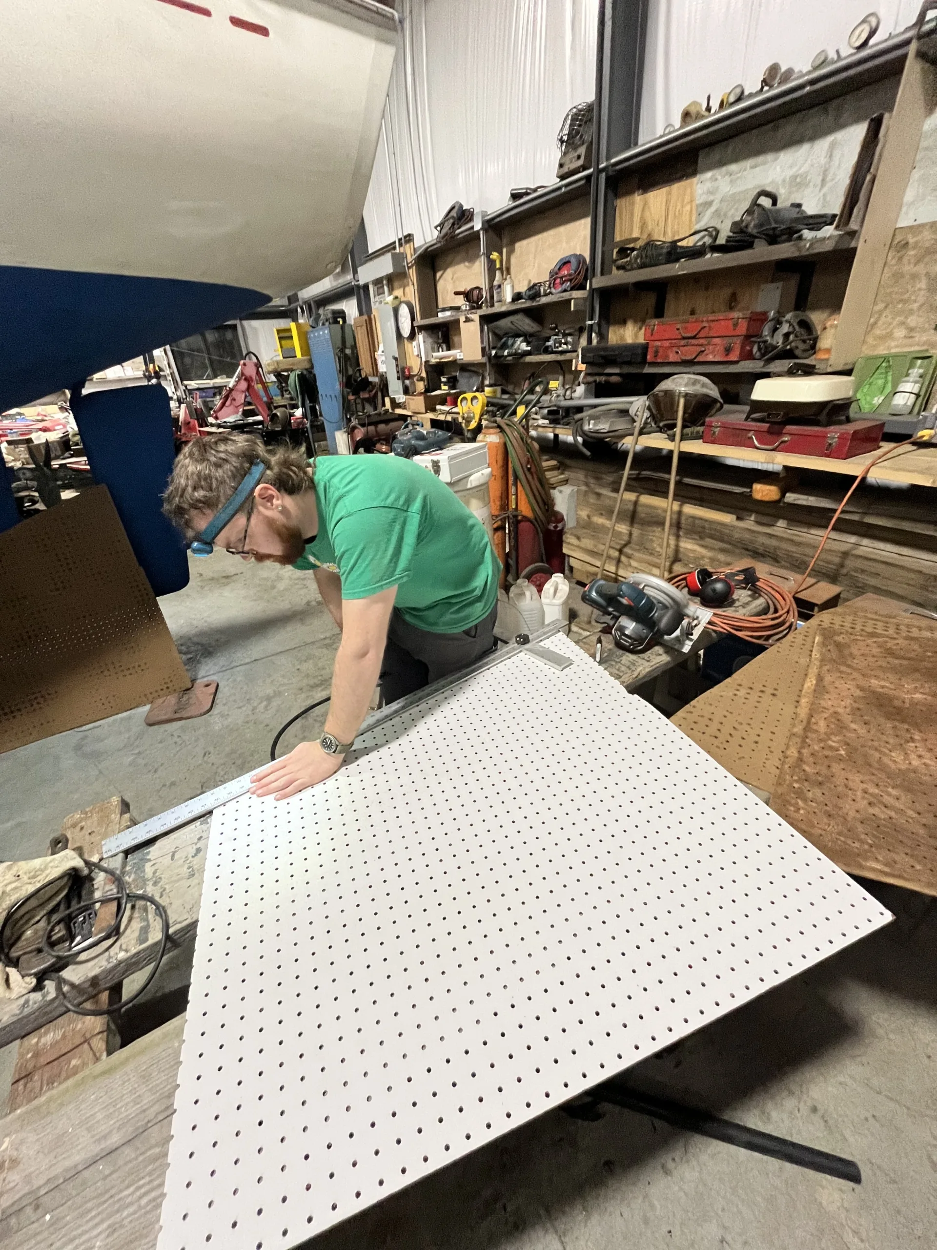 Ian measuring headliner board